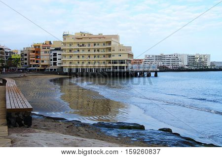 Canary Island Tenerife; Spain -25.05.2016. View of Hotel in El Medano Beach at sunset.El Medano town one of the world's best windsurfing and kitesurfing locations.