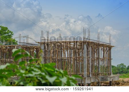 Concrete houses under construction and Sky with clouds