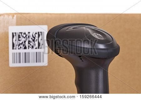 Closeup of the barcode scanner during scanning of cargo.
