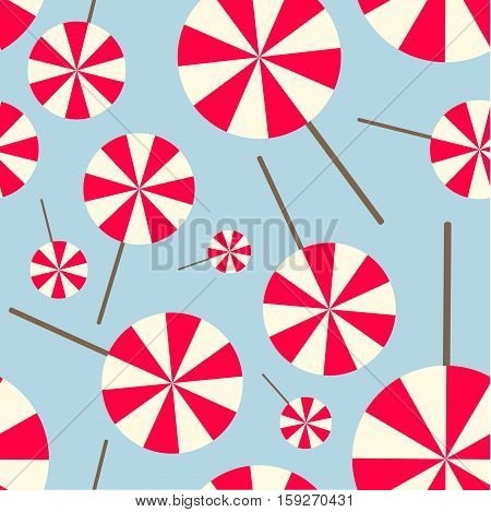 Blue Seamless Pattern with Simple Pink and White Lollipops. Vector illustration food themed texture.