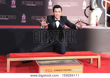 LOS ANGELES - DEC 1:  Donnie Yen at the Donnie Yen Hand And Footprint Ceremony at TCL Chinese Theater IMAX on December 1, 2016 in Los Angeles, CA