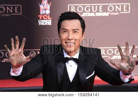 LOS ANGELES - DEC 1:  Donnie Yen at the Donnie Yen Hand And Footprint Ceremony at TCL Chinese Theater IMAX on December 1, 2016 in Los Angeles, CA