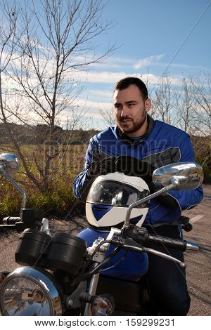 Biker Talking By Phone With His Smarth Phone
