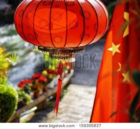 The National Flag Of China And Traditional Chinese Red Lantern