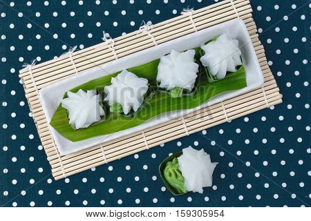 Thai dessert Sweet pandan juice cream topped coconut milk cream call TaKo in Thai