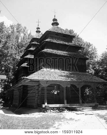 old wooden Church in a clearing among the trees