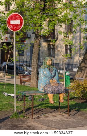 Kiev Ukraine - April 14 2016: Monument called 'Classical grandmother' in the Shevchenko Park a symbol of Kiev grandmas of 80th