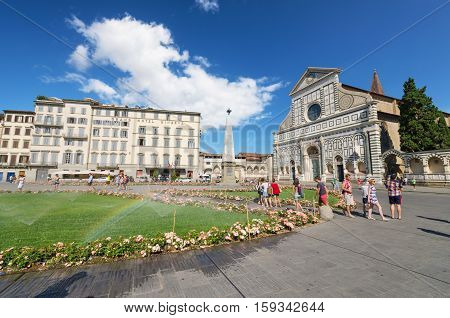 FLORENCE ITALY - AUGUST 17: Tourist visiting famous Basillica Santa Maria Novella on August 17 2013 in Florence Italy.
