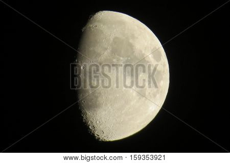 Partial gibbous moon with deep visible craters
