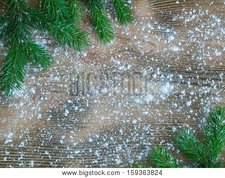 Christmas Tree Green Branches On Winter Snowbound Wooden Space Background
