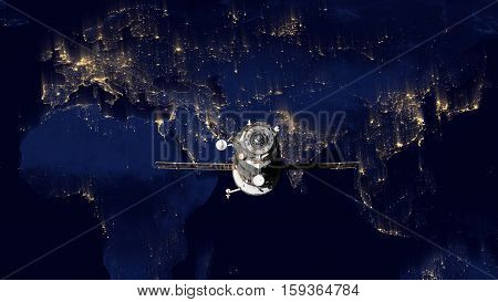 Spacecraft Progress orbiting the earth. Elements of this image furnished by NASA.