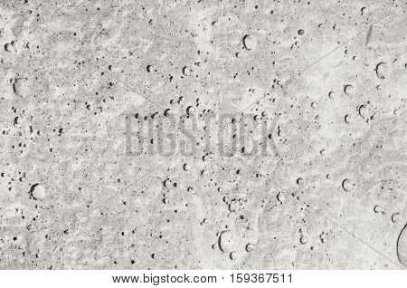 Texture Of Pitted Gray Concrete