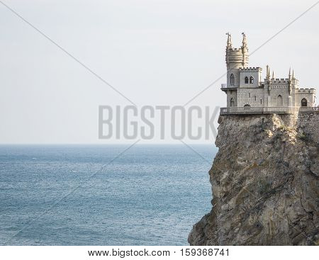 The decorative Neo-Gothic castle Swallow's Nest on the rock over the Black Sea. Gaspra. Crimea