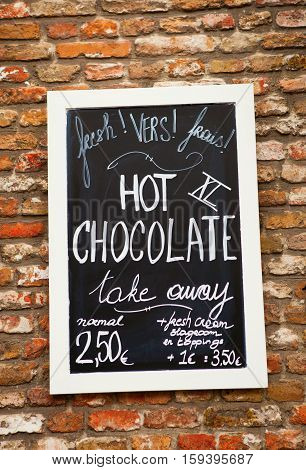 Menu With Hot Chocolate Price On The Wall