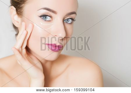 Closeup of female adult with marks on skin for cosmetic medical procedures