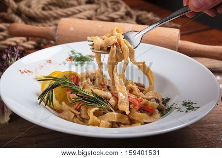 Pasta With Seafood On A Fork.