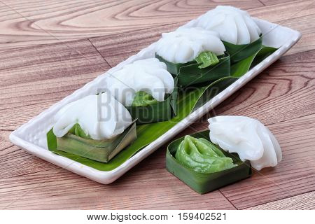 Thai dessert Sweet pandan juice cream topped coconut milk cream call TaKo in Thai