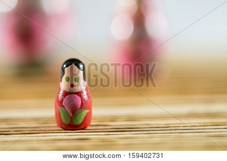 Russian dolls on a wooden table. Matrioshka.