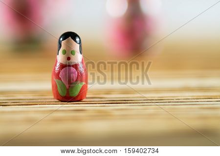 Russian dolls on a wooden table. Matrioshka.