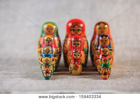 Russian dolls. Matryoshka on linen fabric for the background.