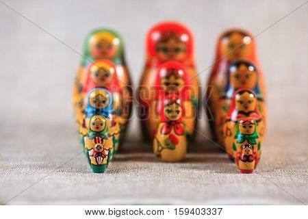 Russian dolls. Matryoshka on linen fabric for the background.