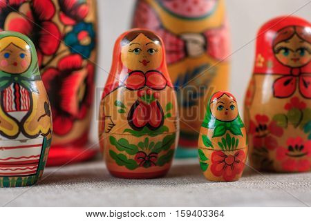 Russian dolls. Matryoshka on linen fabric for the background.