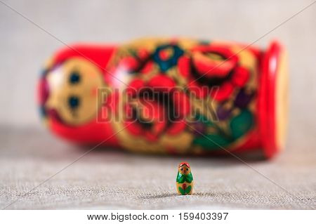 Russian dolls. Matryoshka on linen fabric for the background.