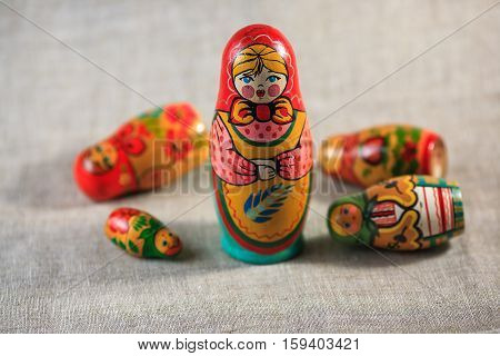 Russian dolls. Matryoshka on linen fabric for the background.