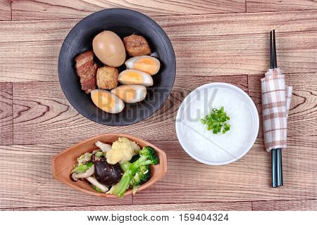 Rice Gruel And Stewed Boiled Egg  And Fried Vegetables.