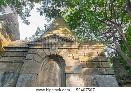 KOLKATA WEST BENGAL INDIA - NOVEMBER 2ND 2014 : Old cemetery at south Park Street Kolkata. It is one of the earliest non-church cemetaries in the world heritage site of Kolkata earlier Calcutta