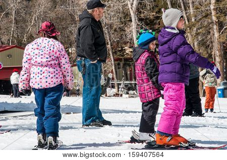 Group of Young Girl learning how to Ski at Ski School lessons at Sipapu Ski Resort , New Mexico , USA - Editorial: February 28th 2012