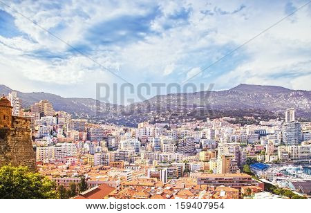 Monaco Montecarlo principality aerial view cityscape. Skyscrapers mountains and marina. Azure coast. France Europe.
