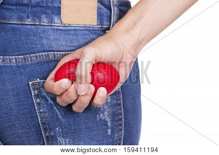 Hands of a woman squeezing a stress ball