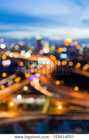 Blurred light highway overpass interchanged with twilight sky background