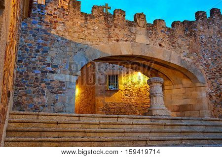 Caceres Arco de la Estrella Star arch sunset in Spain entrance to monumental city image shot from the public floor