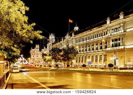The Calle De Alcala And The Cybele Palace (palacio De Cibeles) On The Cybeles Square In Madrid At Ev