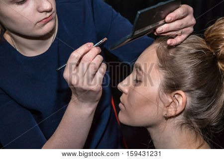 Make-up Artist Doing The Make-up For Nice Girl