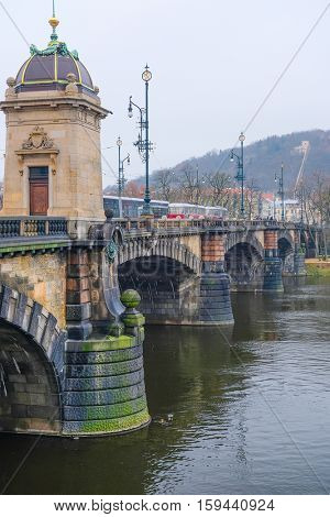 Panorama of an old Prague, bridges and embankment of Vitava river, Czechia