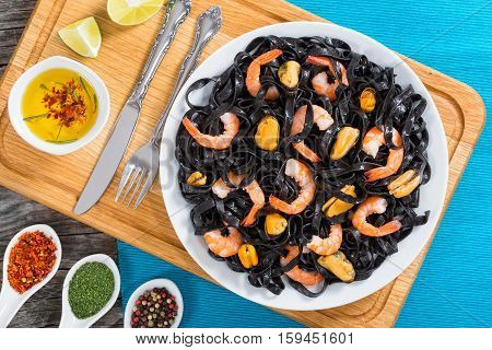 Delicious Squid Ink Black Noodles With King Prawns And Mussels