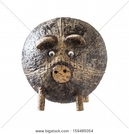 Coconut shell pig is handmade in Thailand on white background.