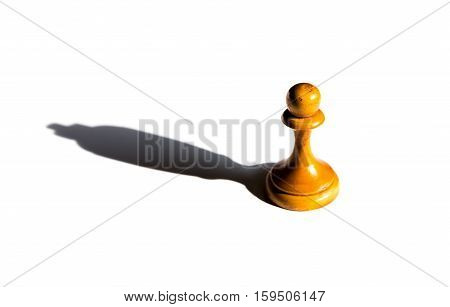 a chess pawn casting a king piece shadow concept of strength and aspirations