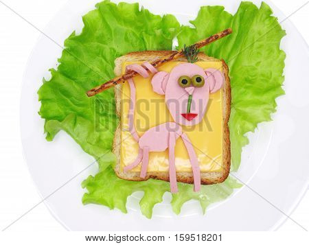 creative sandwich with cheese and salame monkey shape