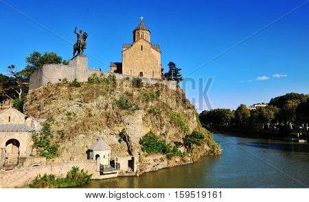 Metekhi Church statue of King Vakhtang Gorgasali and Kura river Tbilisi Georgia