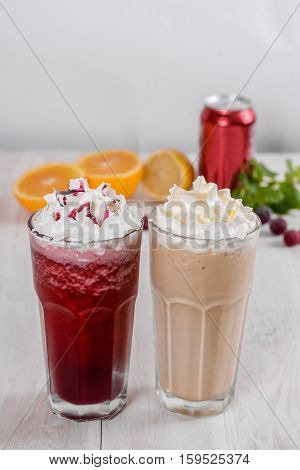 Milkshake shot close-up on a wooden background in the decoration