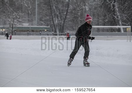 Saint-Petersburg Russia - December 2 2016: Urban outdoor ice rink in the park.