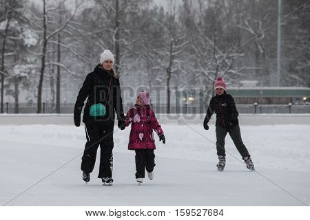 Saint-Petersburg Russia - December 2 2016: Urban outdoor ice rink in the park.