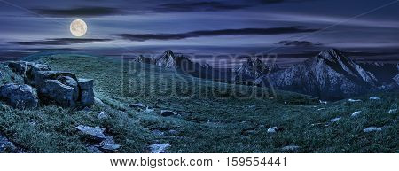 Huge Stones In Valley On Top Of Mountain Range At Night