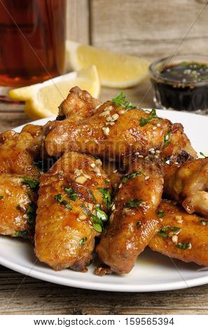 Fried chicken wings in ginger garlic marinade with herbs