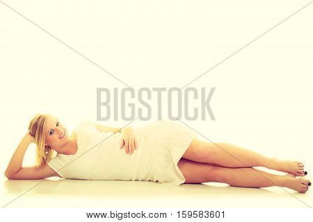 Subtlety and delicacy of women. Young fabulous stunning charming woman in white clothes. Casual beauty blonde lady.