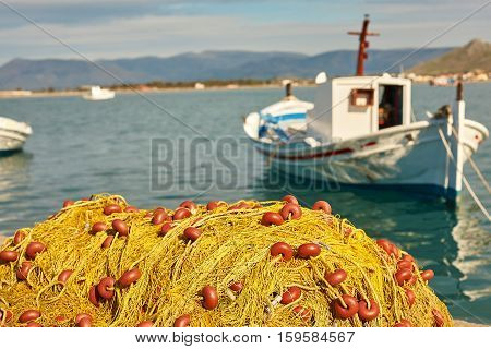 Pile Of Yellow Fishing Nets In Port